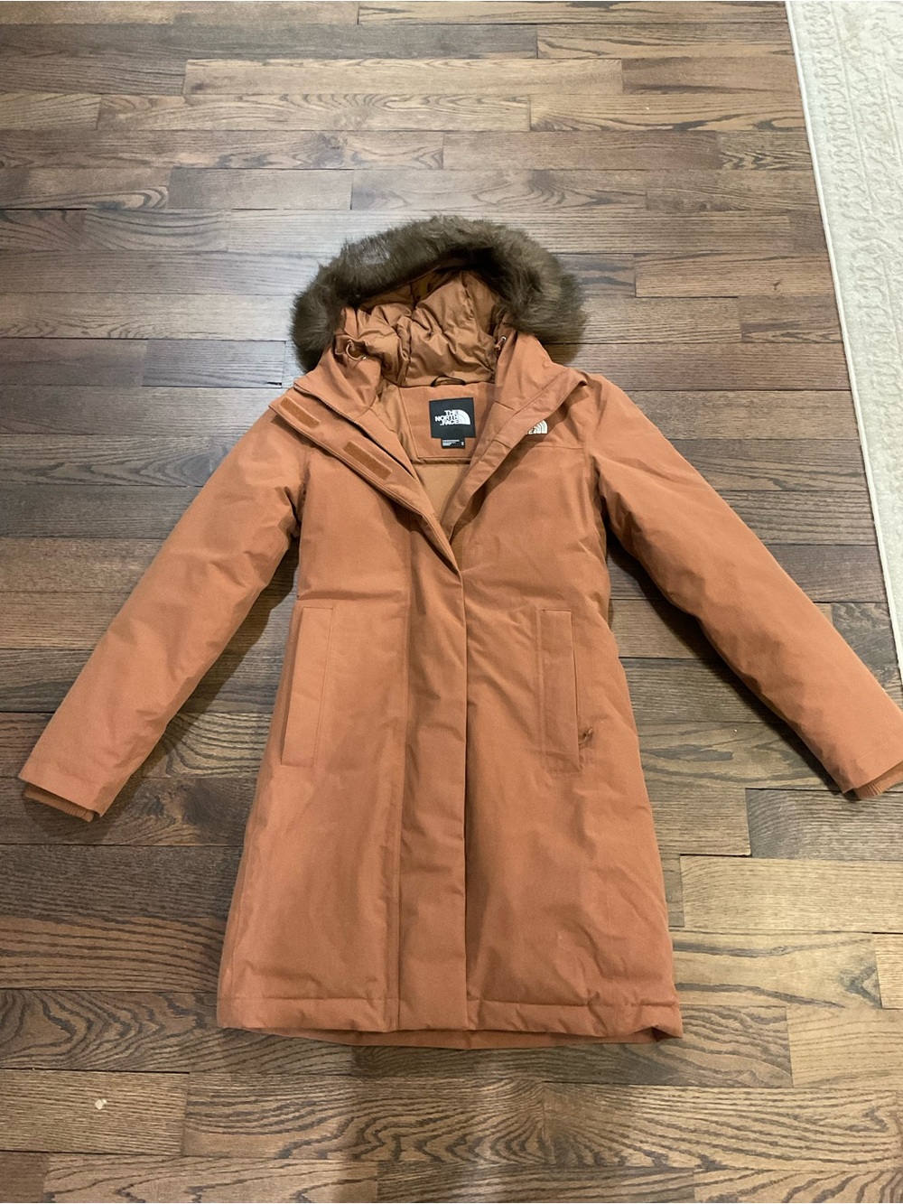 The North Face Women’s Parka in Rust Orange with Faux Fur Hood